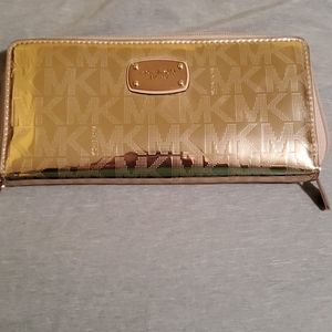 MK Jet set wallet metallic rose gold